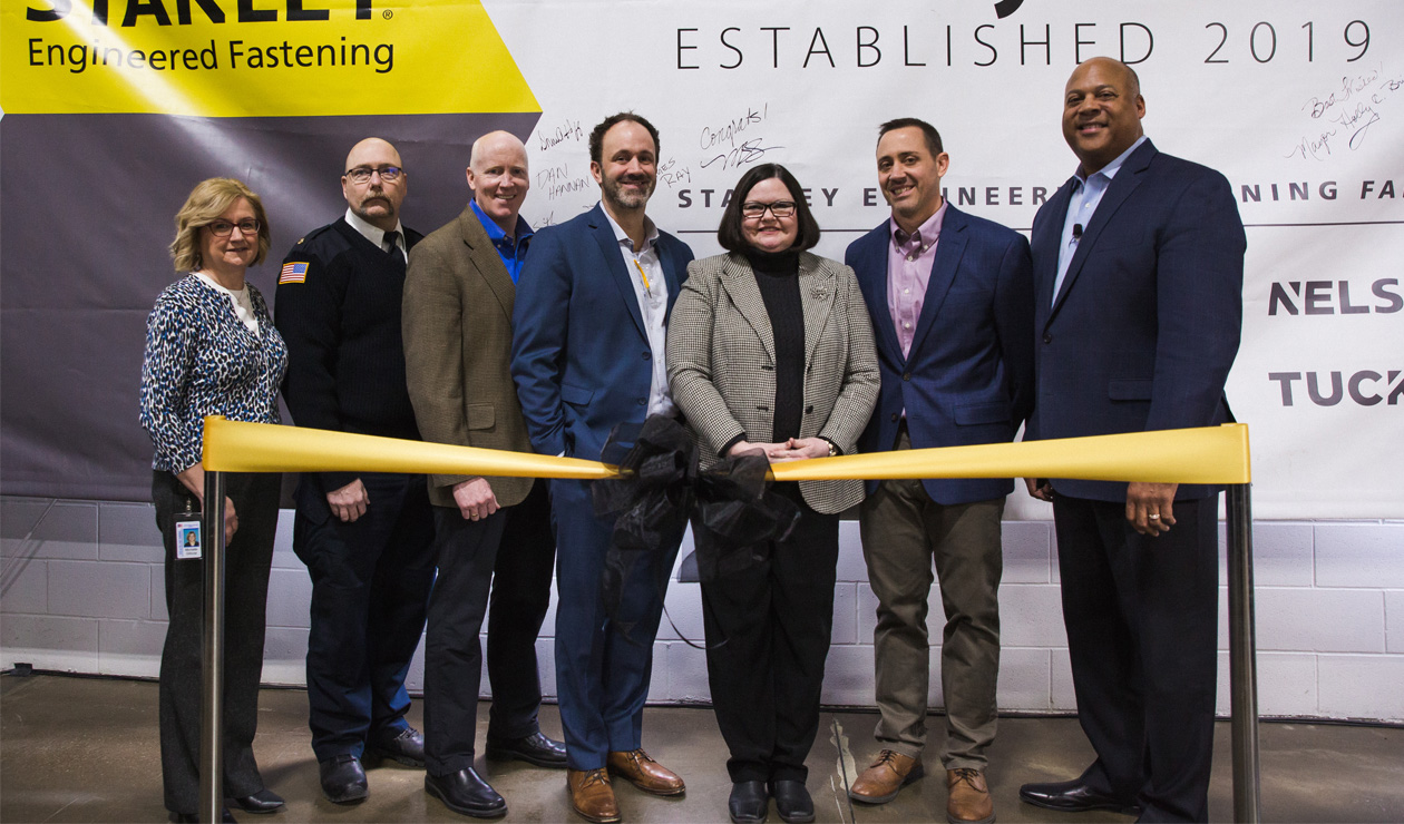 STANLEY executives with elyria and ohio government at ribbon cutting for libery court facility